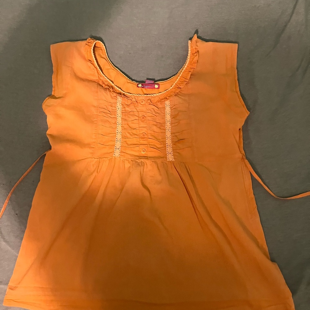 Sugar Orange Ruffled Sleeveless Blouse